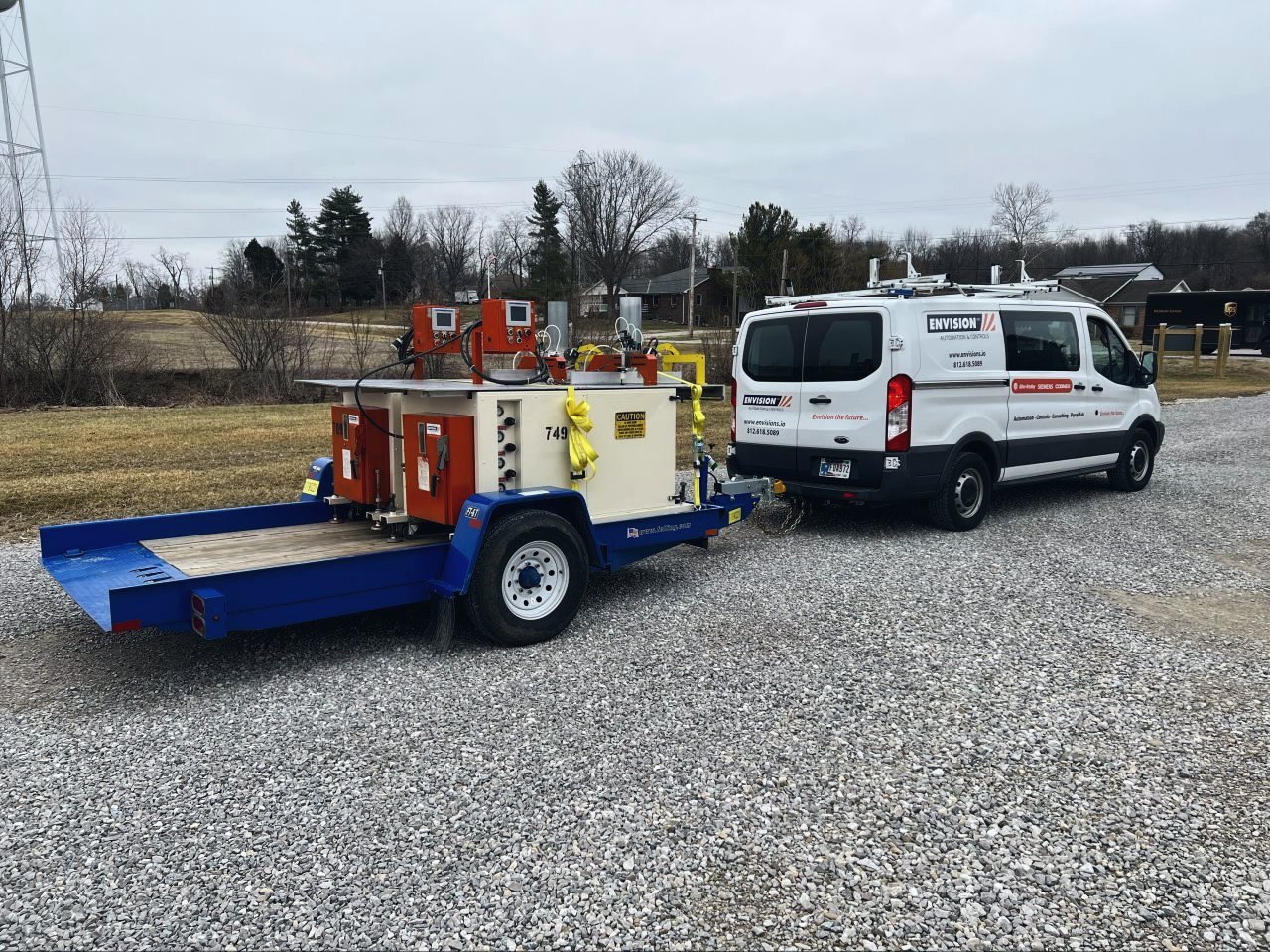 Envision service van towing equipment to a customer site