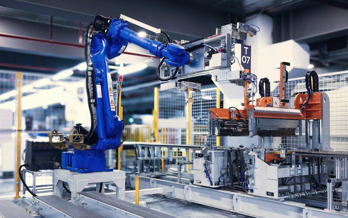 Industrial robot cell (stock photo)